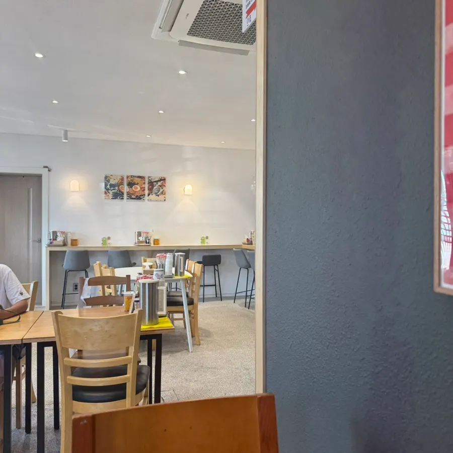 Interior of Ichiba Ramen with Japanese ramen-shop atmosphere and wall decor