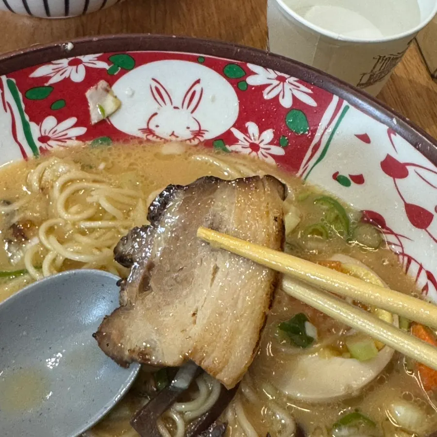 Close-up of tonkotsu ramen showing rich pork broth and noodles