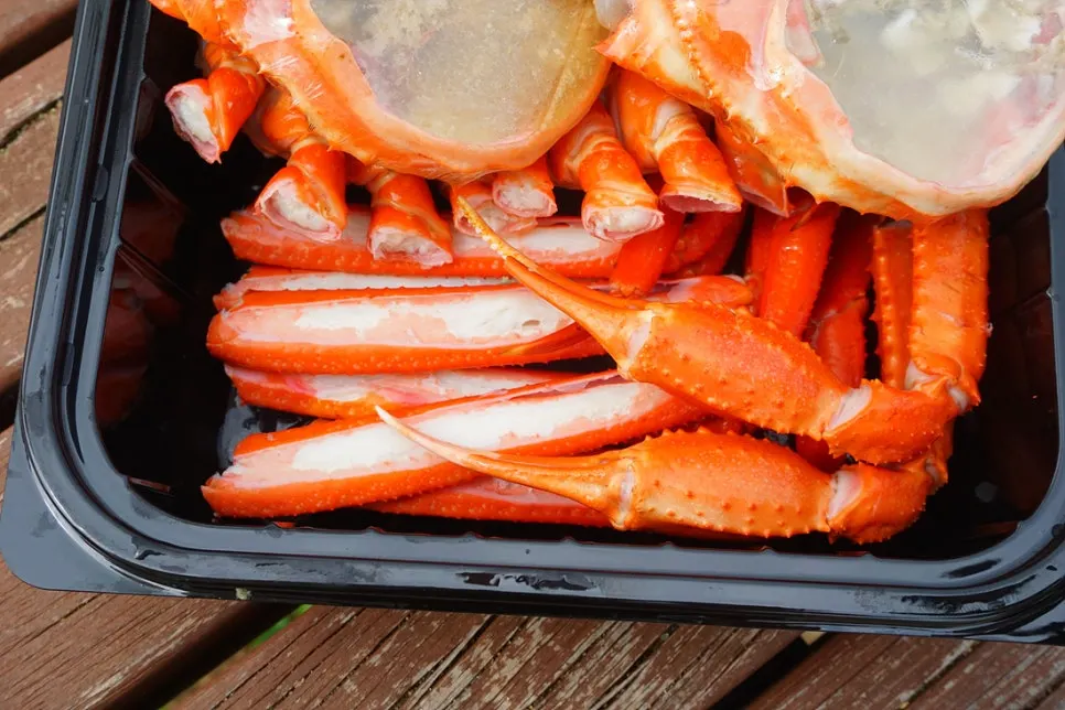 Red snow crab shell filled with roe and guts