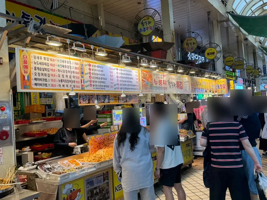 Exterior and sign of Hwangbuja Twigim in Sokcho Jungang Market
