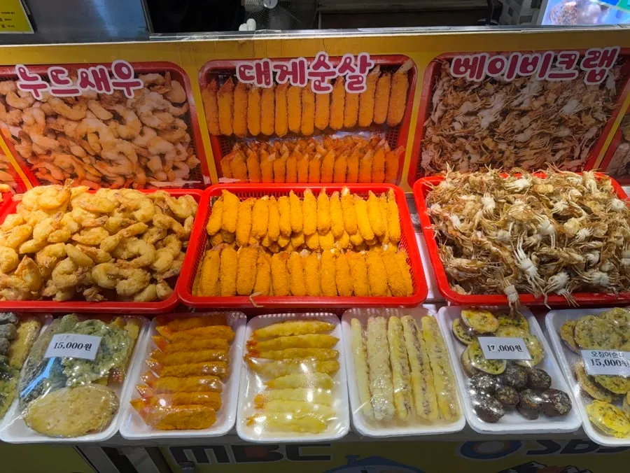 Snow crab meat tempura, baby crab, and assorted tempura on display