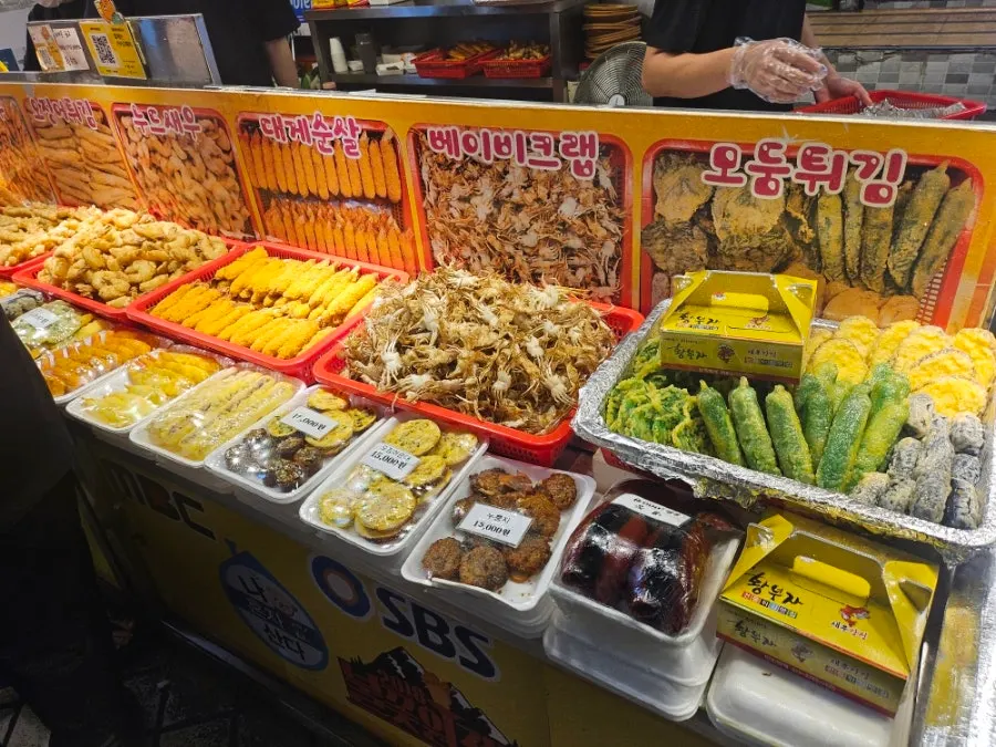 Tempura and pancake items displayed with price list