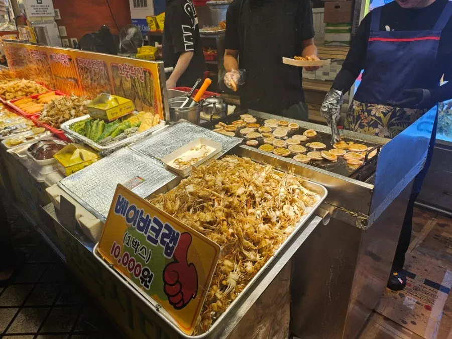 Nurungji squid sundae being grilled on a griddle