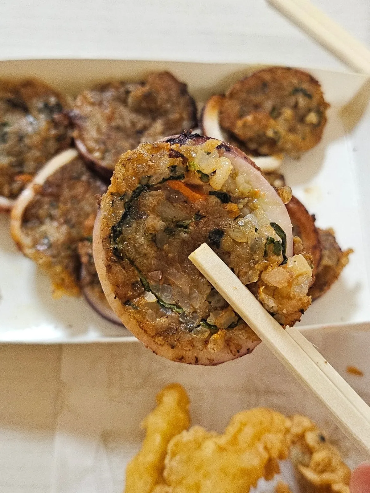 Nurungji squid sundae dipped in soy sauce