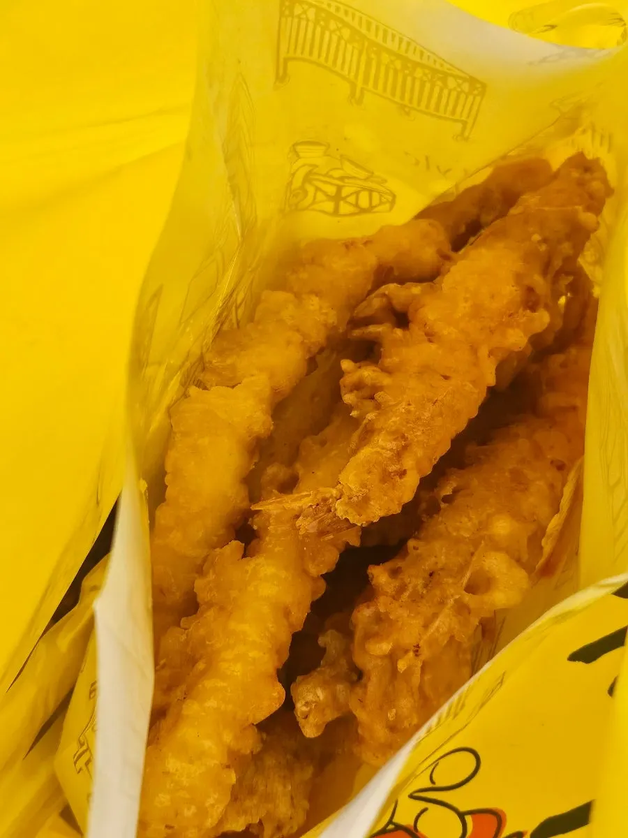 Tempura packed in a paper-lined bag