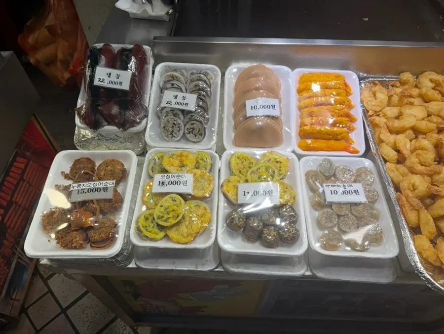 Sign explaining Hwangbuja Twigim's half-and-half set menus