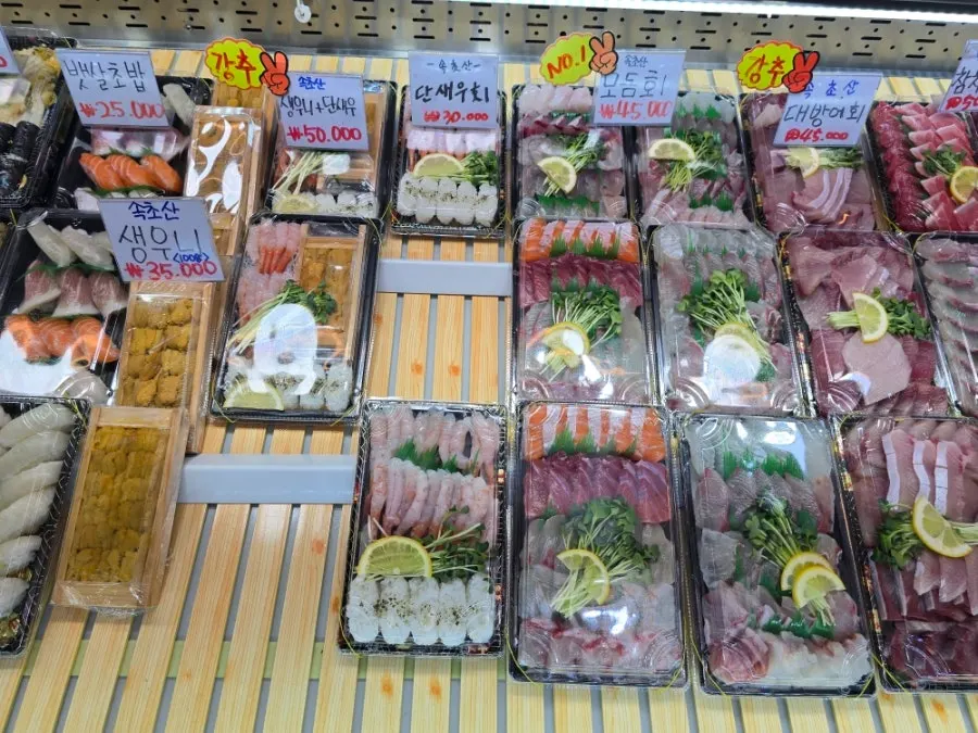Salmon sashimi and rockfish makhoe boxes