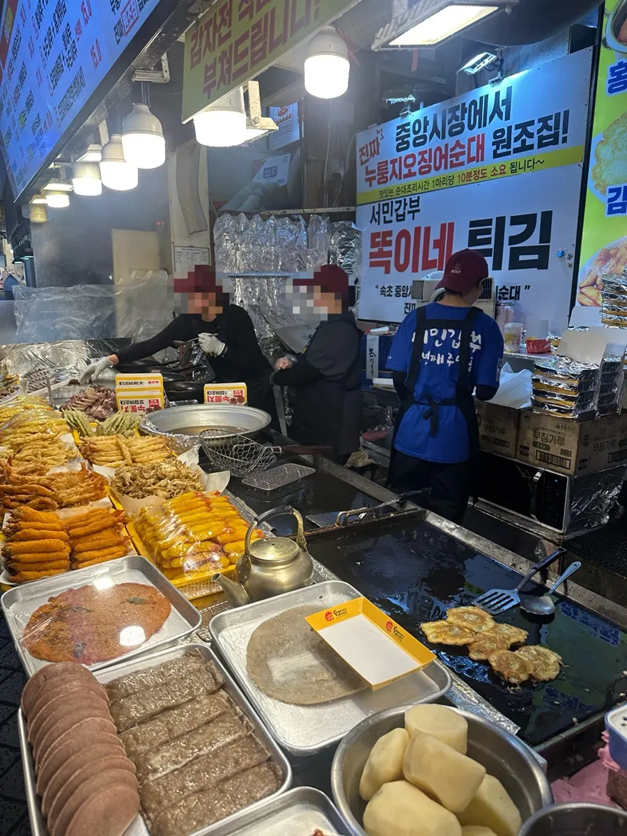 Fried food display in front of Seomin Gapbu Ttokine Twigim