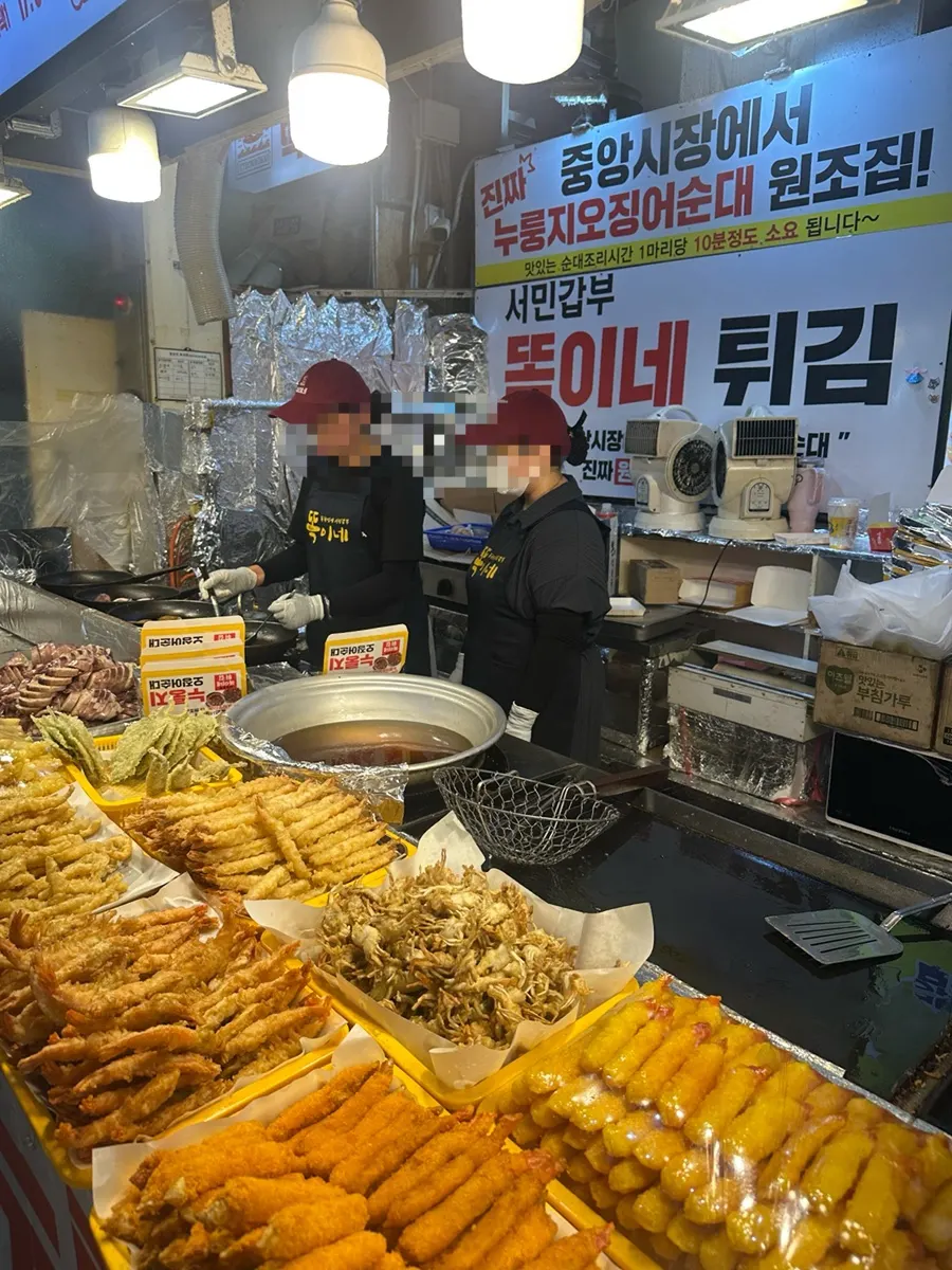 Fried chicken being packed for takeout