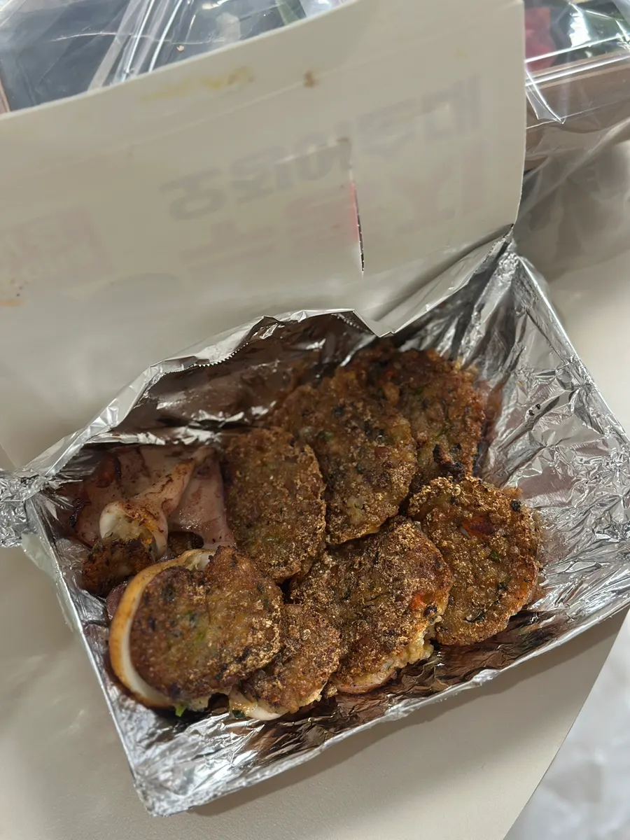 Packed box of half-and-half spicy fried chicken