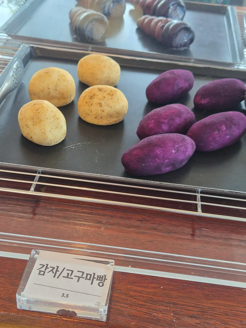 Vertical photo of the bread display sorted by type