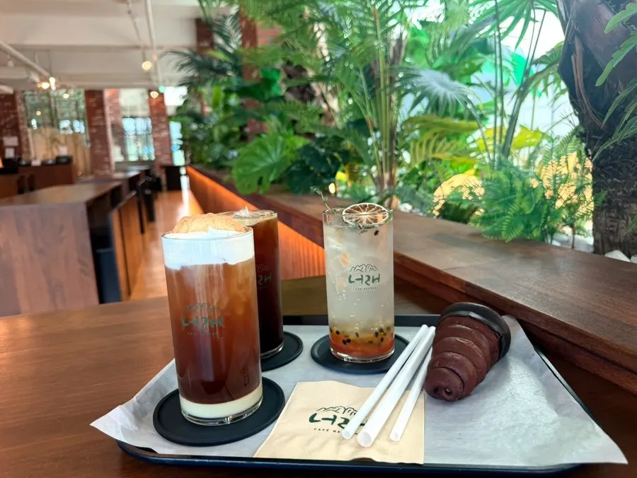 Floor-to-ceiling windows and Seoraksan view at Cafe Neorae, Sokcho