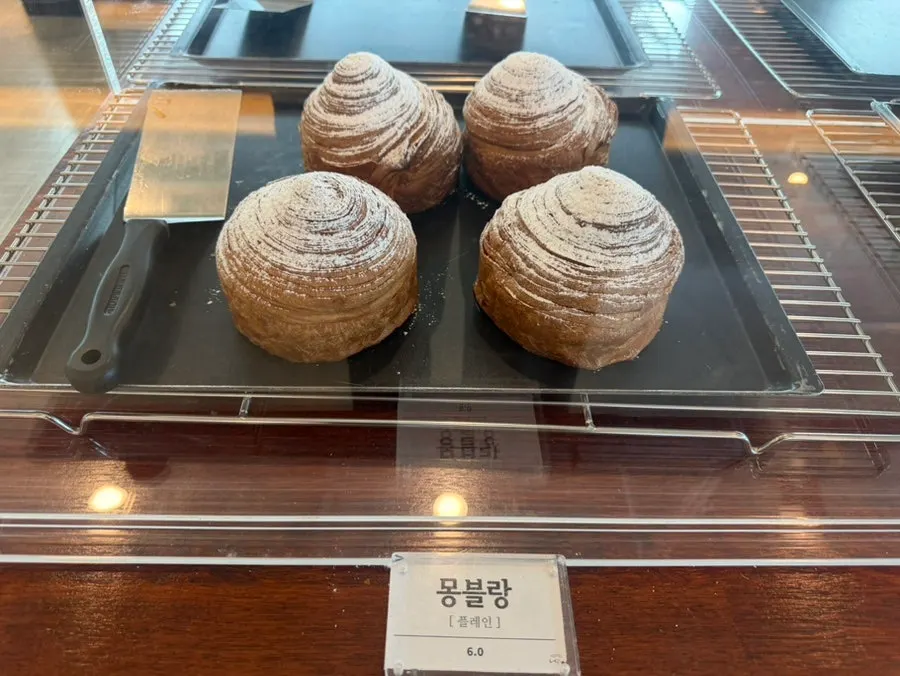 Bread and coffee on the table at Cafe Neorae