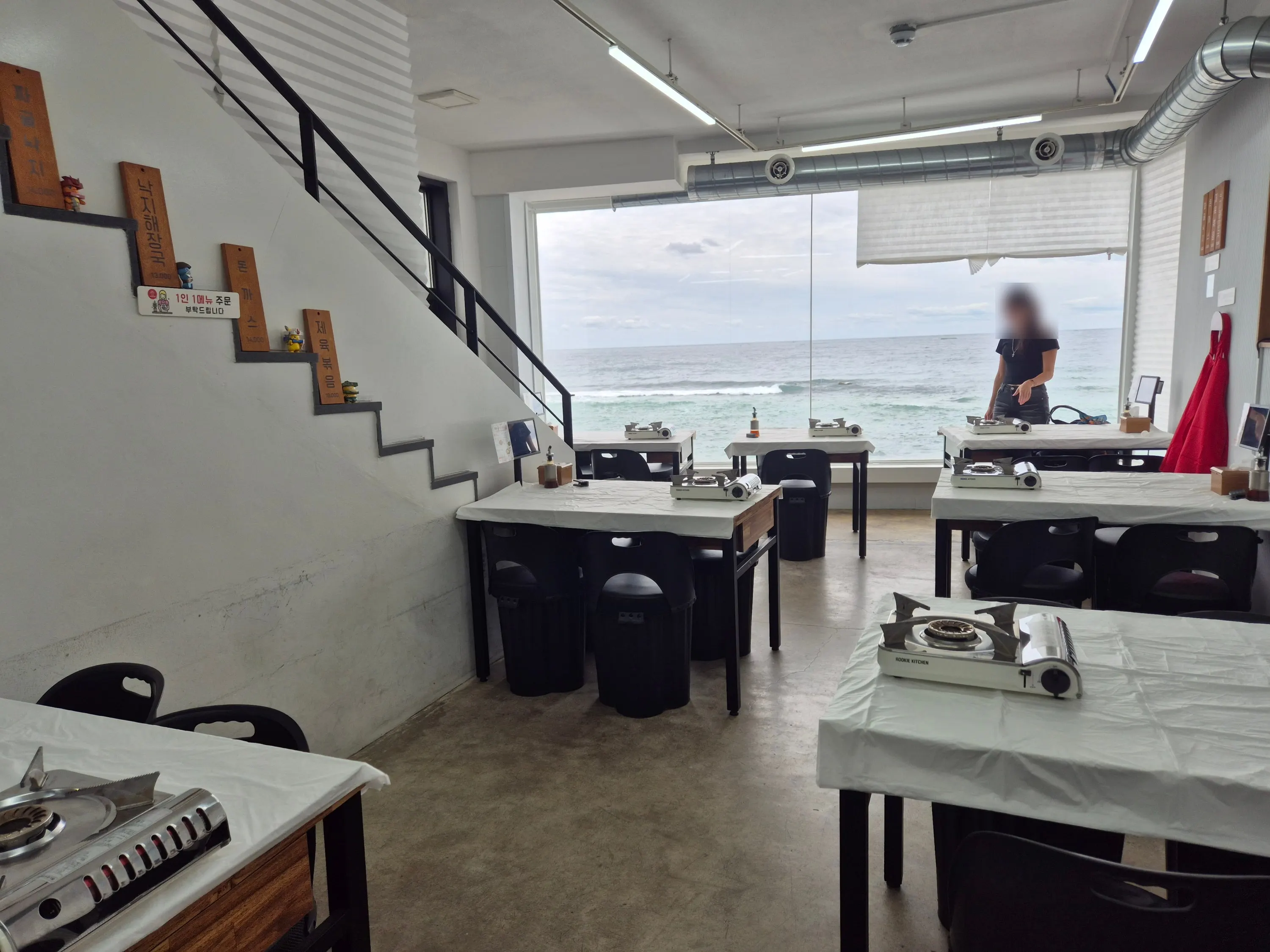 Sea view beyond the floor-to-ceiling windows