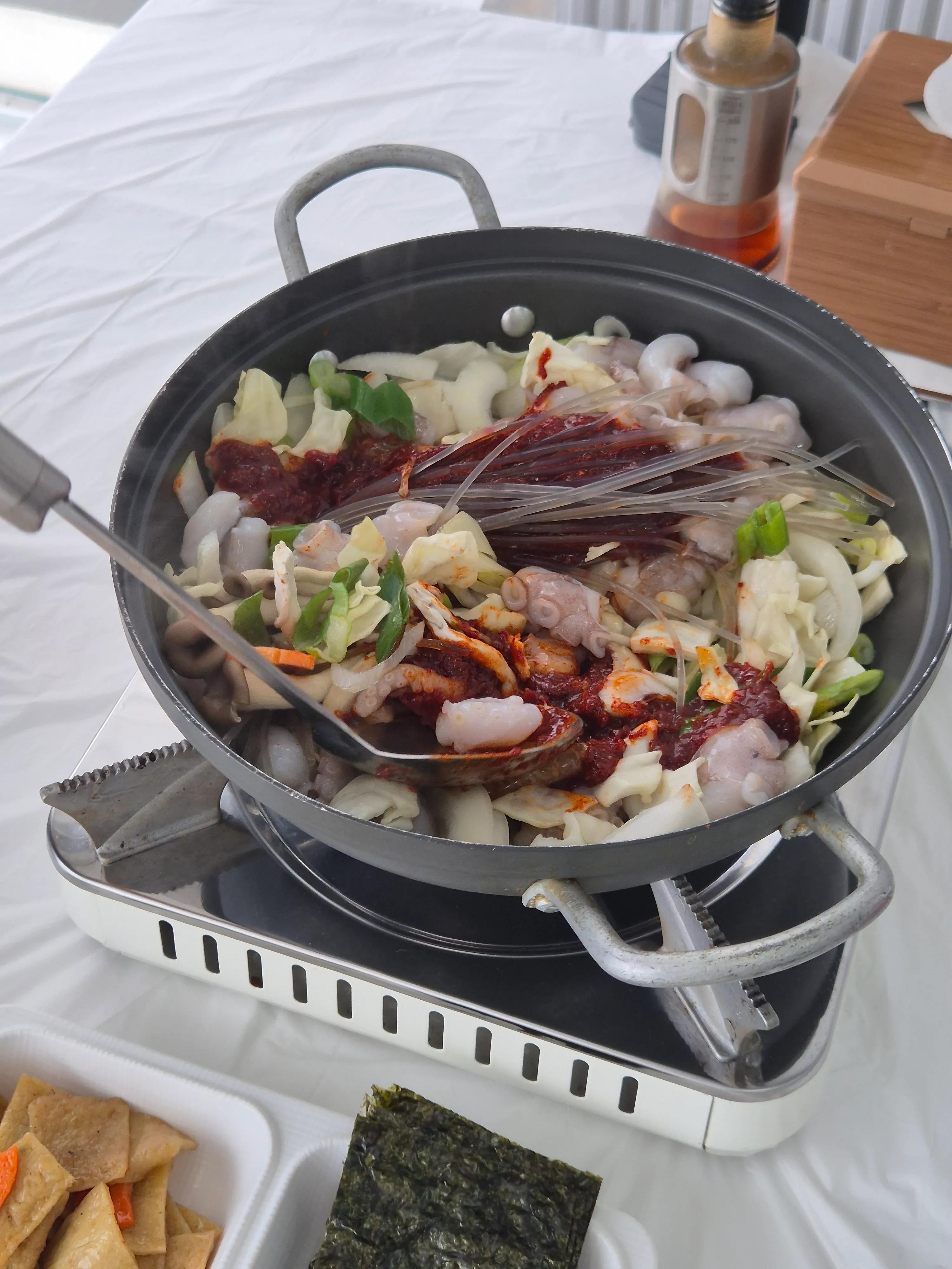 Seasoned bean sprouts served with jjageul nakji