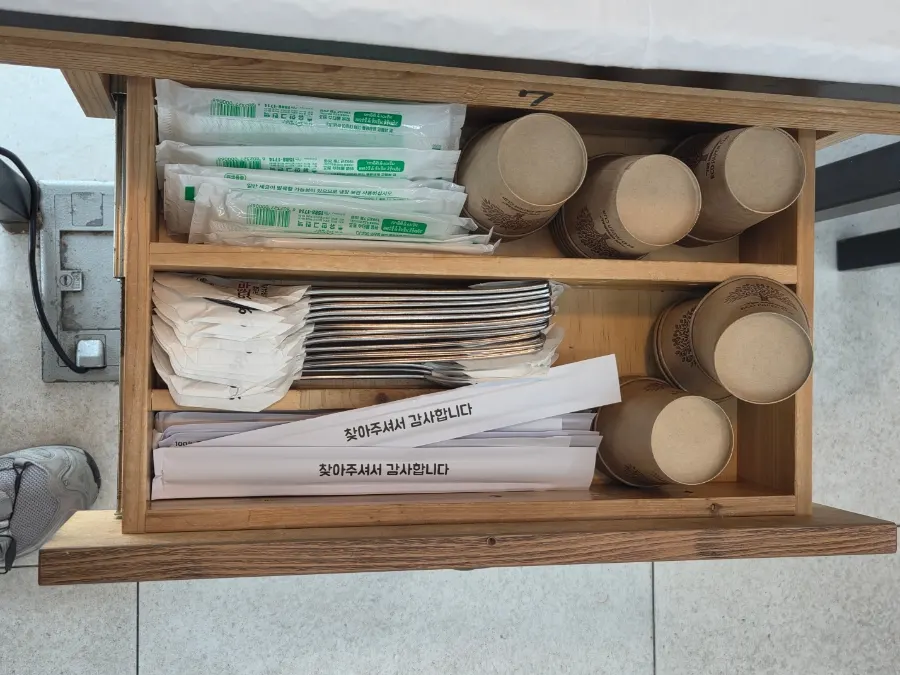 Table setting of side dishes for a sundubu meal
