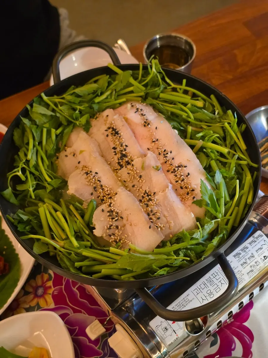 Table scene with soju glasses filled