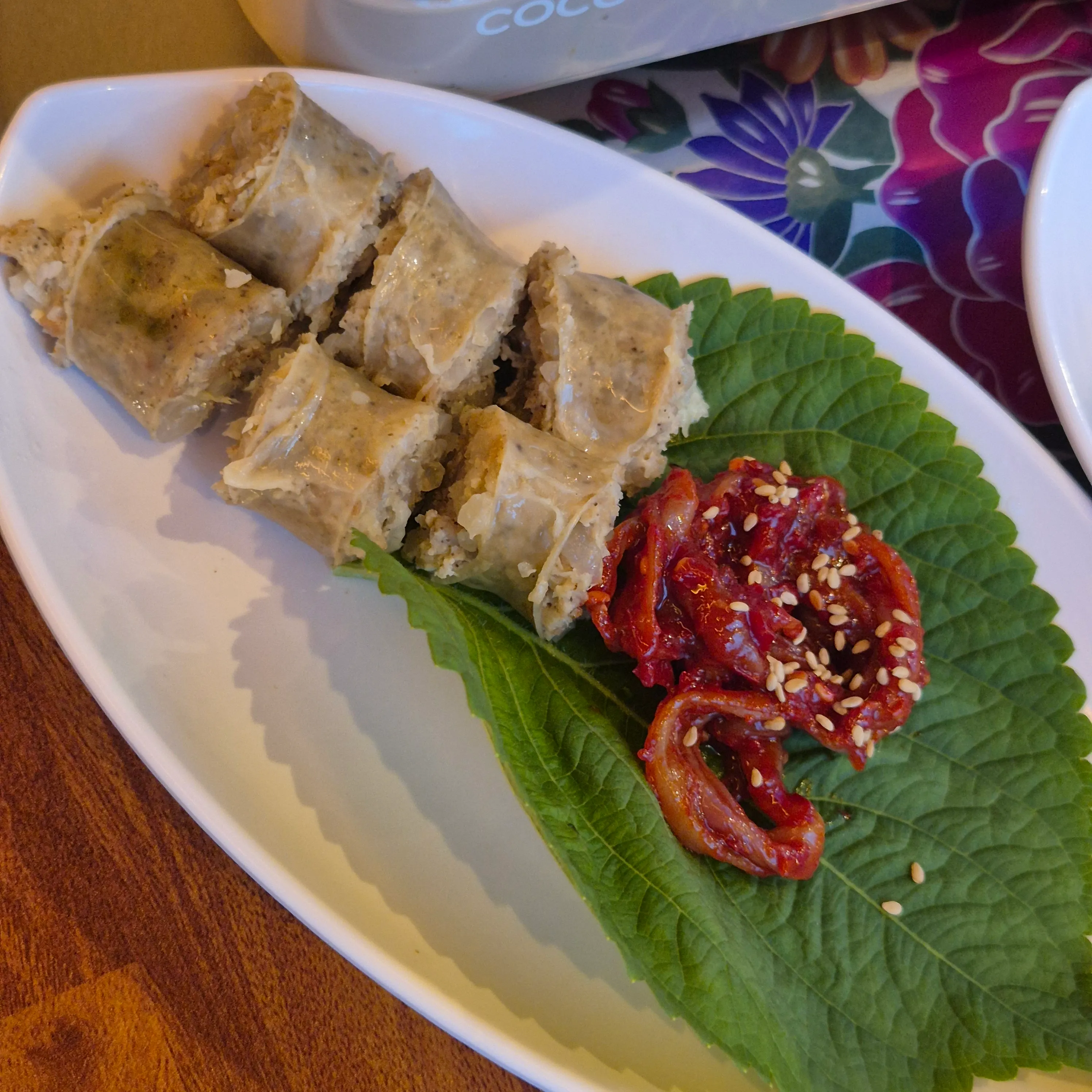 Warm boiled pork served with minari (water dropwort)