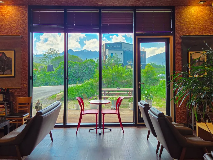 Café seating with a view through a large window