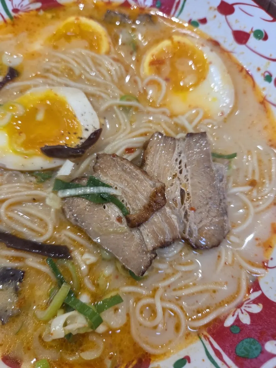 Chashu and soft-boiled egg in the karai ramen