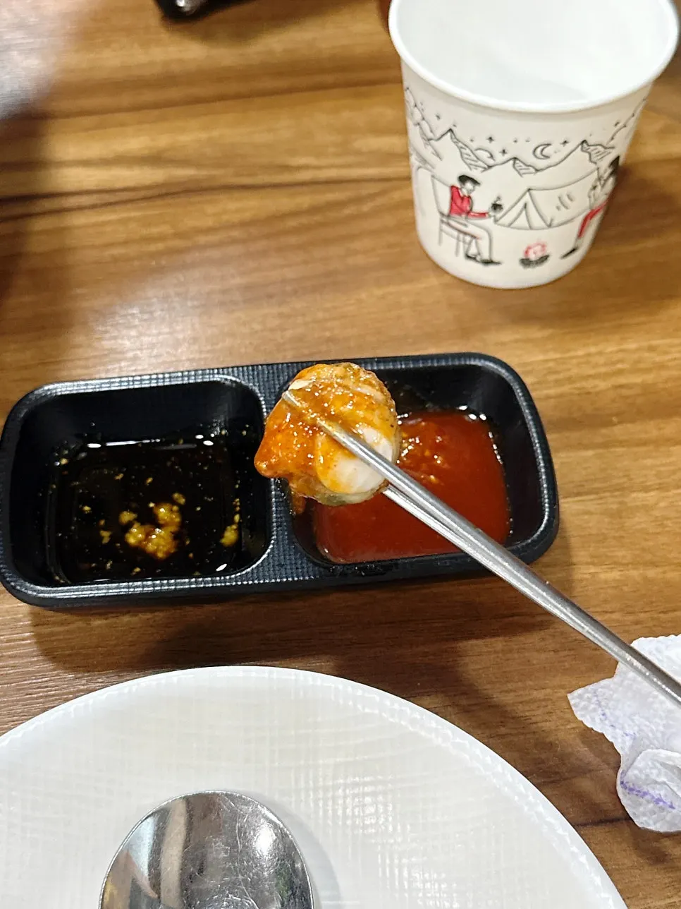 Seafood from Sokcho Haemul Kkot Jangkalguksu cooking in the broth