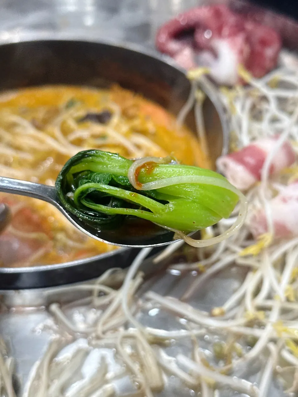 Abalone, mushrooms, bok choy and other vegetables on the platter