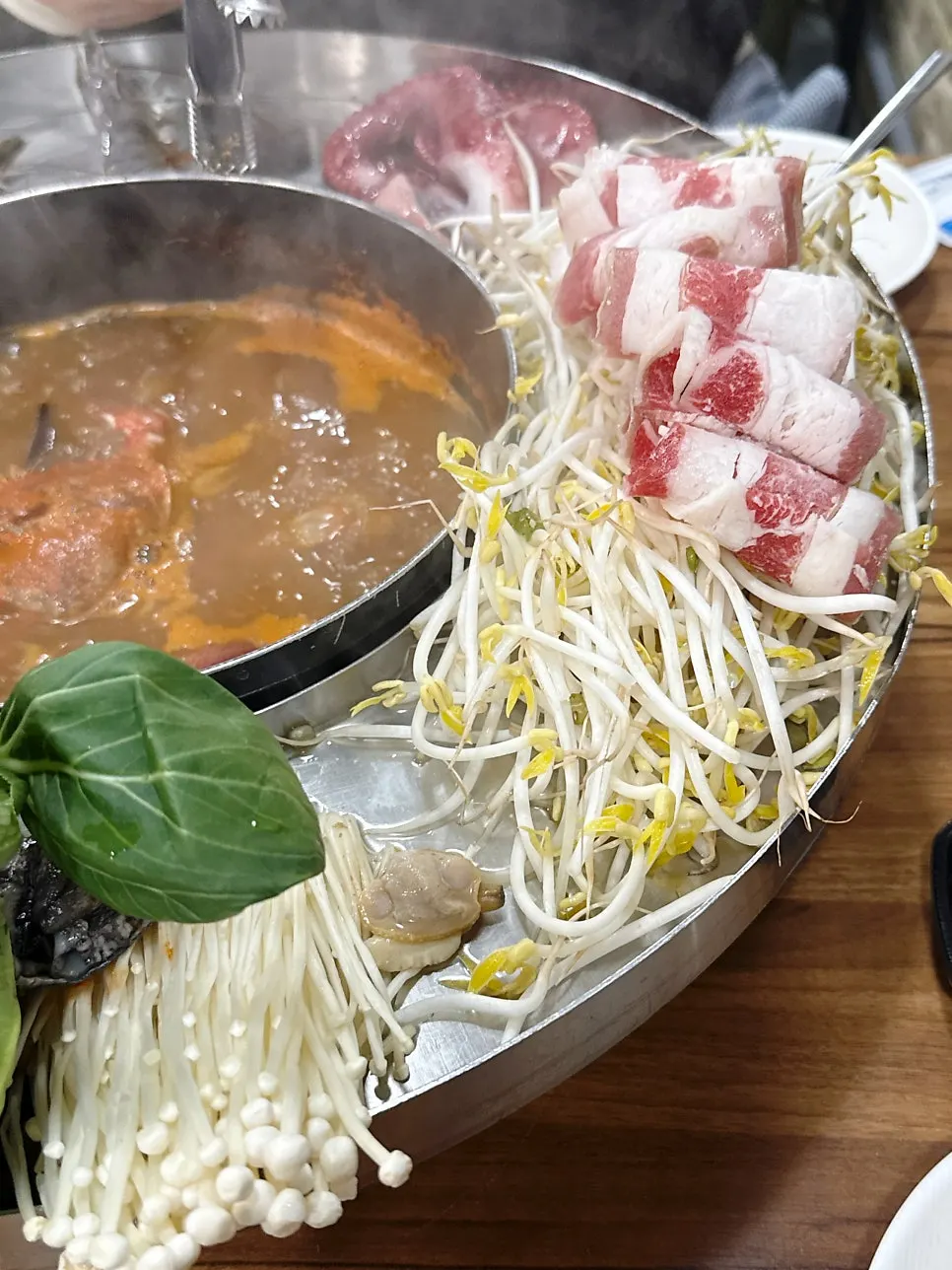Beef and bean sprouts cooked in the broth