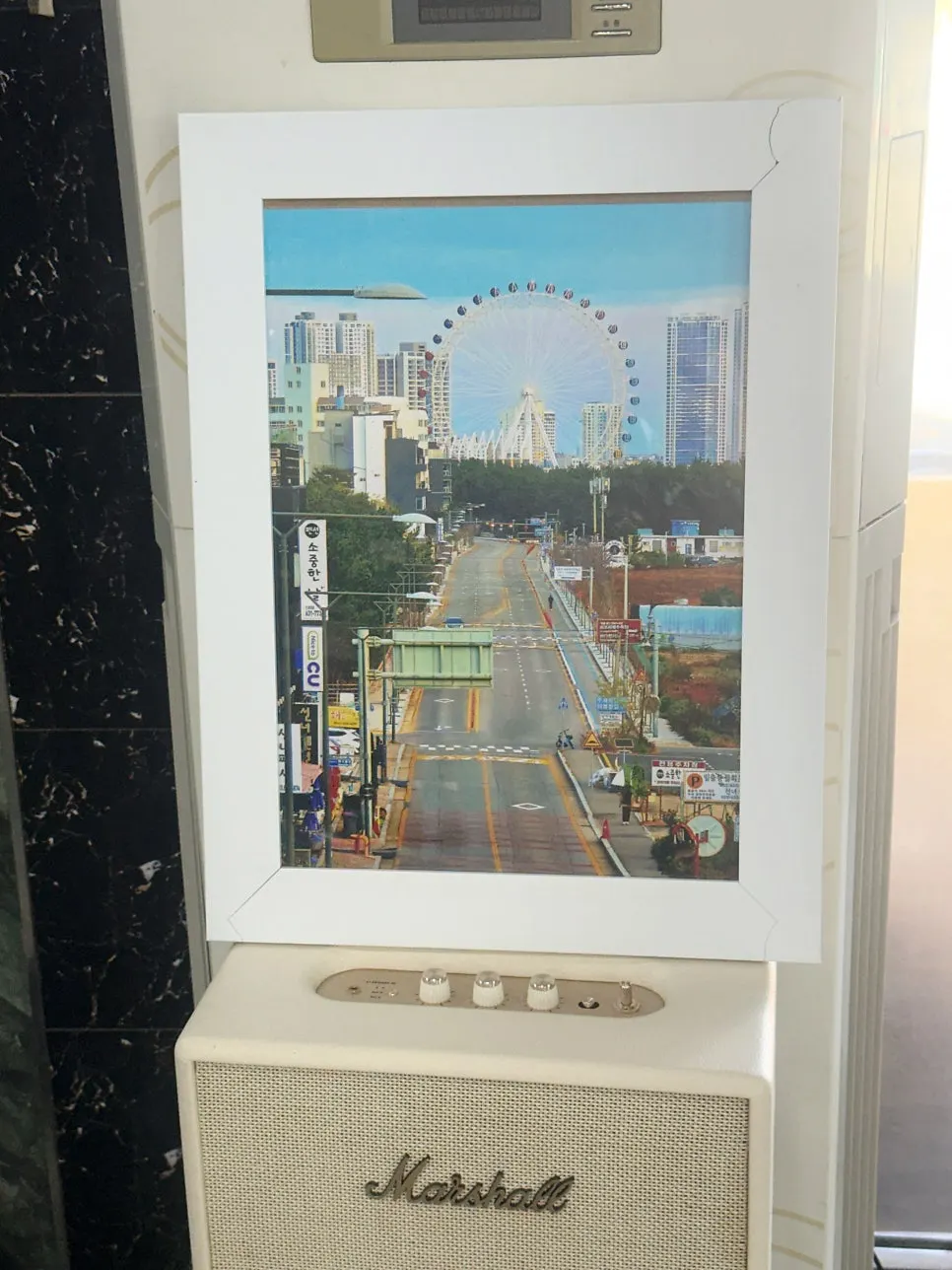 Storefront with the 'Haemul Kkot Jangkalguksu' sign visible