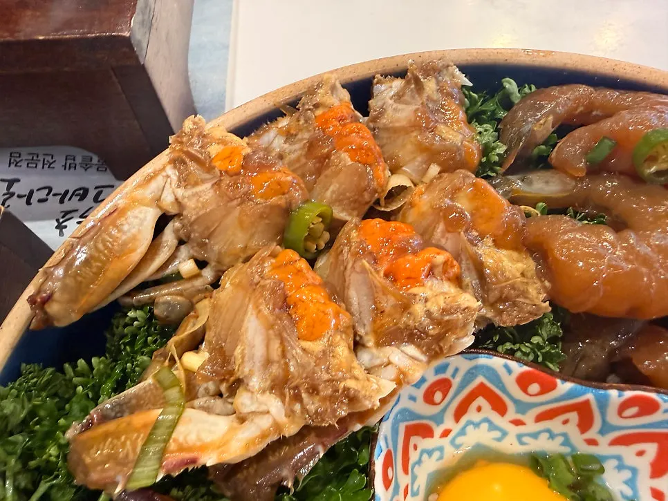 Upscale assorted seafood in soy sauce plating