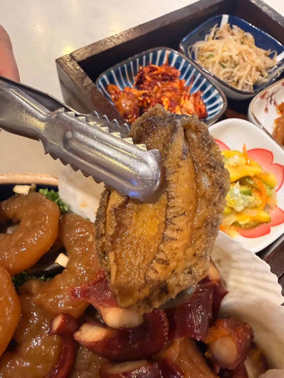 Seafood in soy sauce with abalone