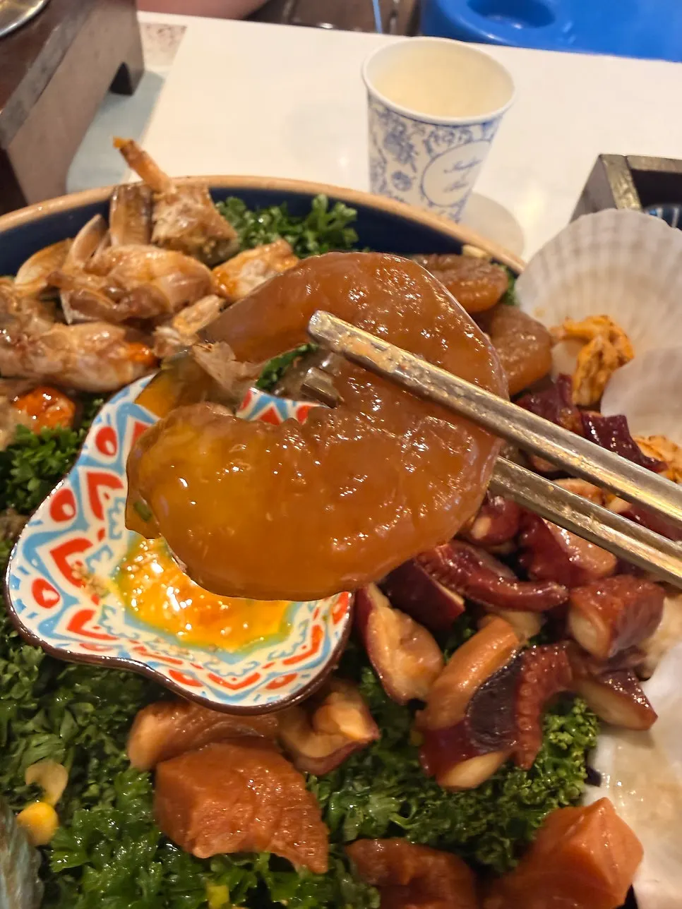 Seafood in soy sauce dipped in egg-yolk sauce