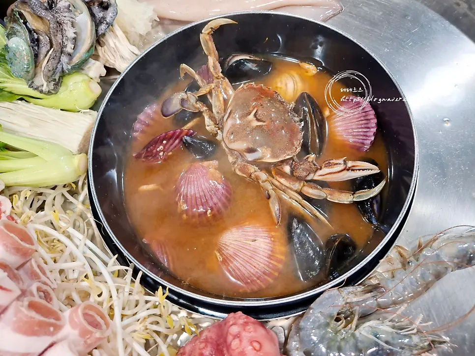 Close-up of abalone and seafood on the flower platter