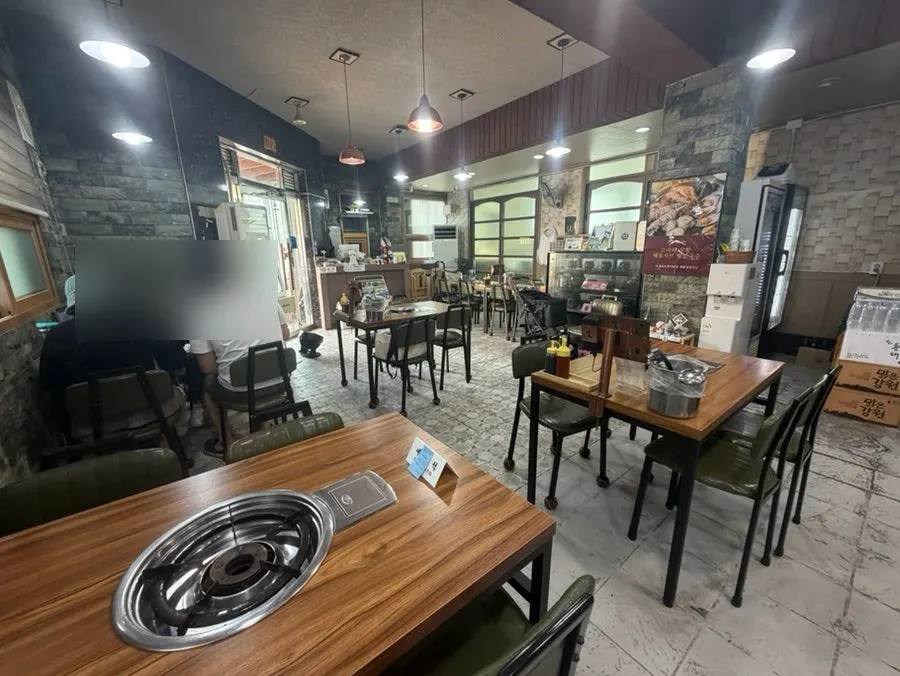 The restaurant entrance and surrounding building