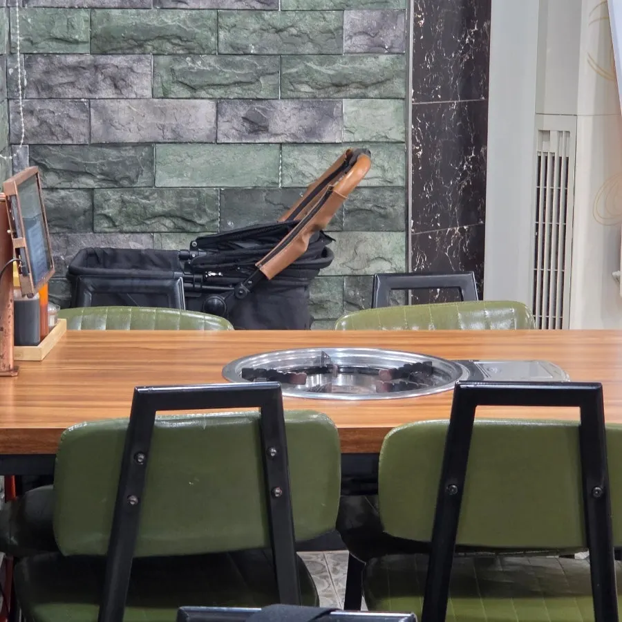 Restaurant interior with table seating