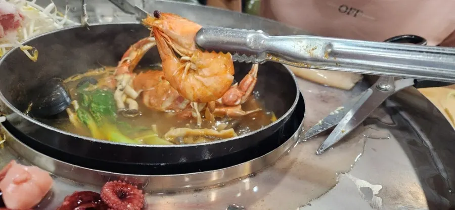 Shabu ingredients with abalone innards