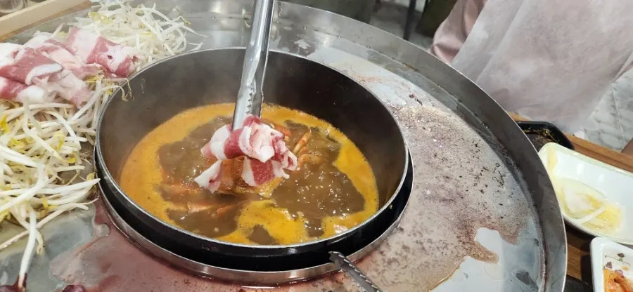 Blue crab flavoring the broth