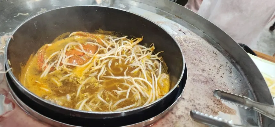 Blue crab in seafood shabu broth