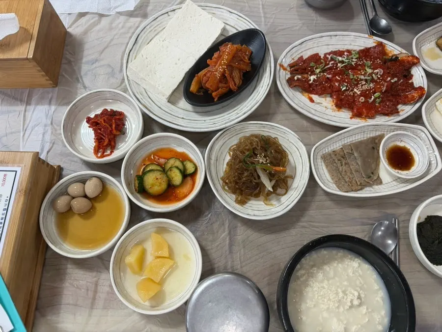 A table filled with a variety of Korean side dishes