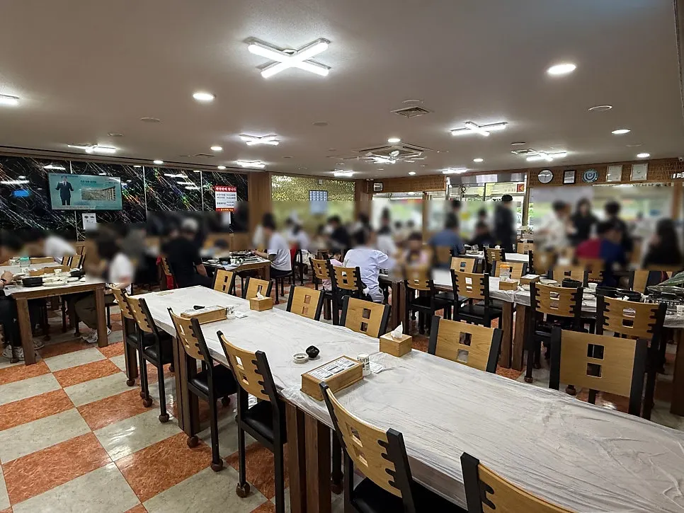 Group dining space set up beside the main hall