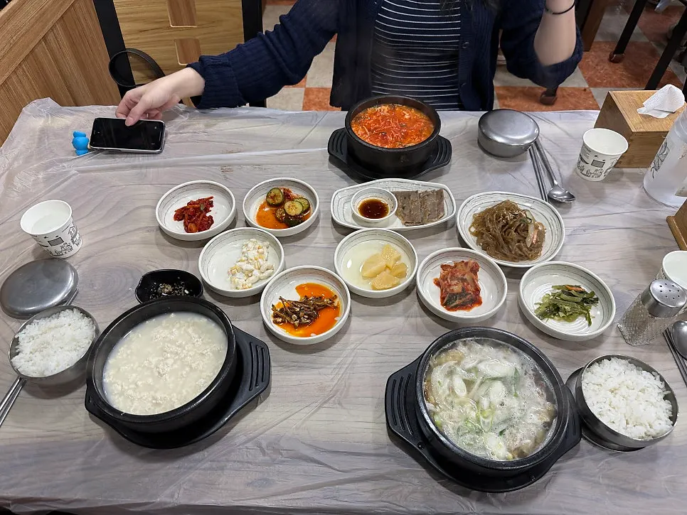 Chodang sundubu, spicy sundubu, and hwangtae haejangguk on the table