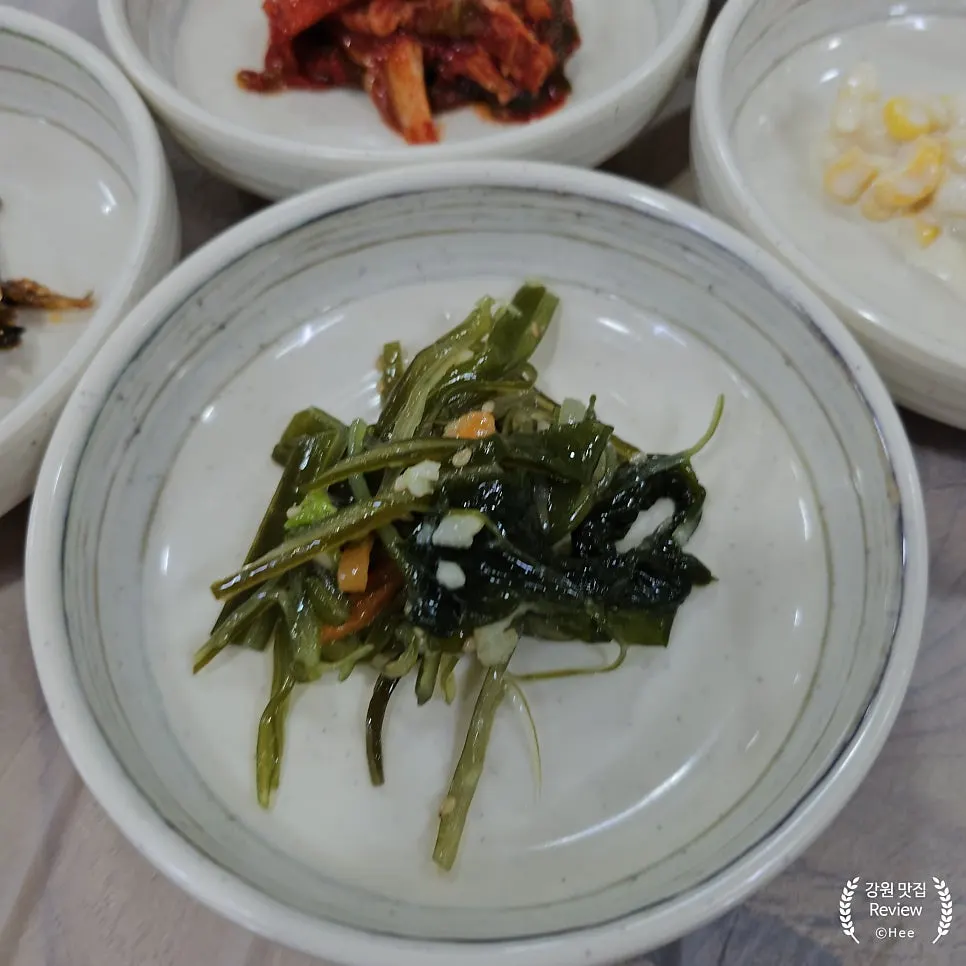 Assorted side dishes on multiple plates