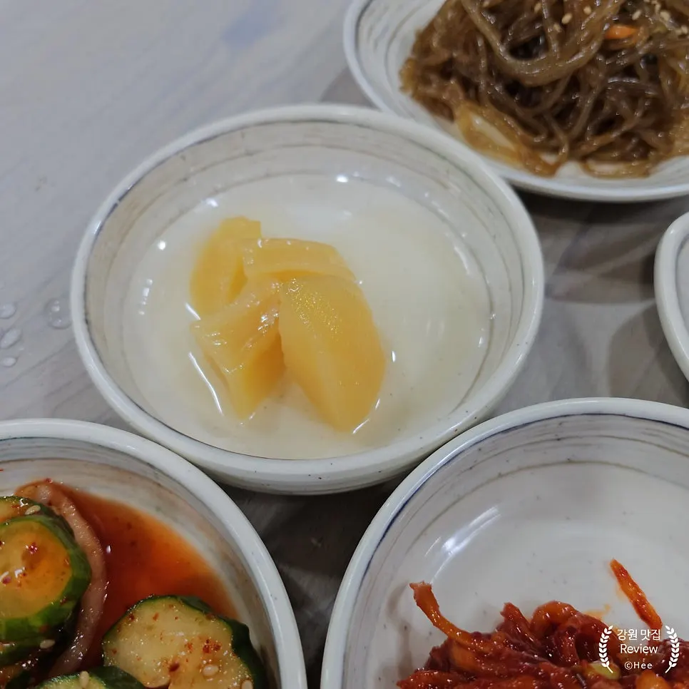 Table spread with side dishes and rice