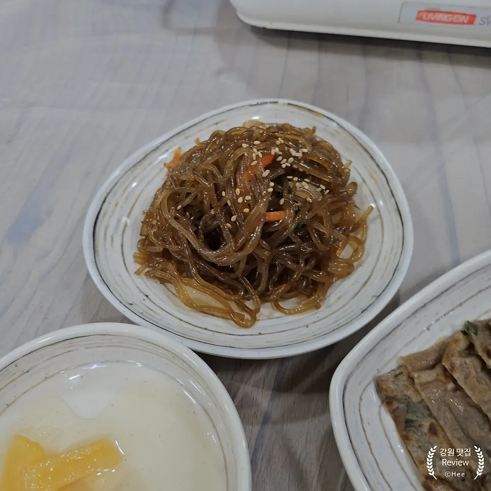 Eating the meal alongside the side dishes