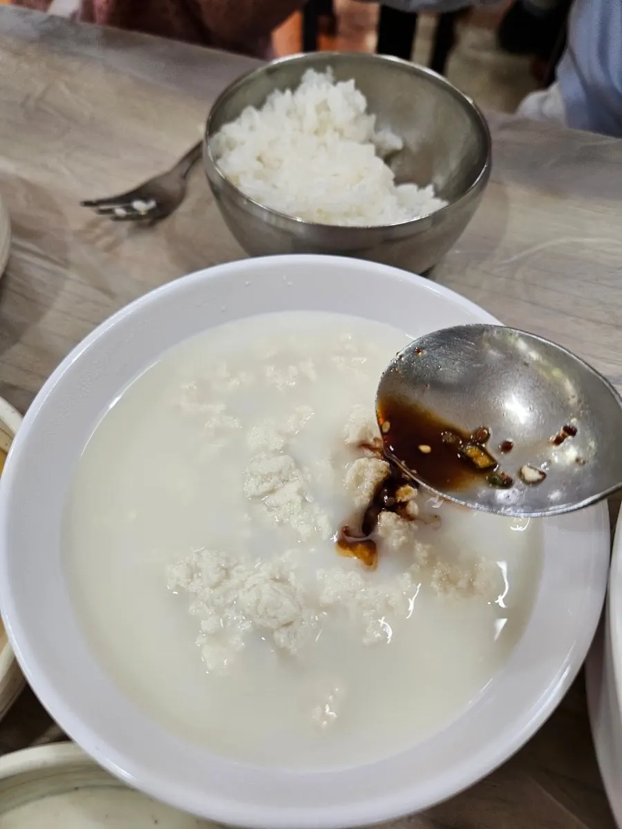 Family sharing sundubu and rice