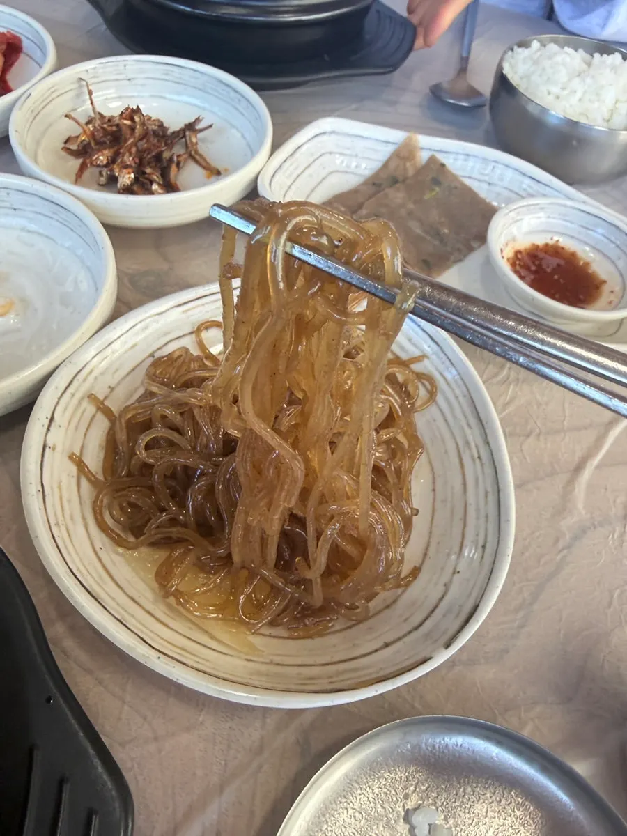 Salted squid side dish mixed with radish strips