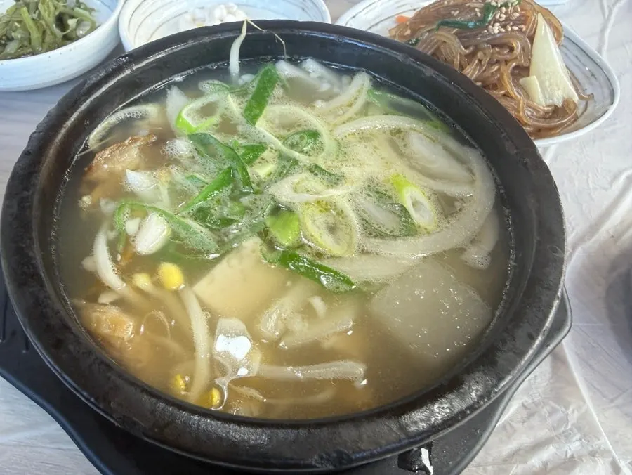 Broth and pollack flakes in the hwangtae haejangguk