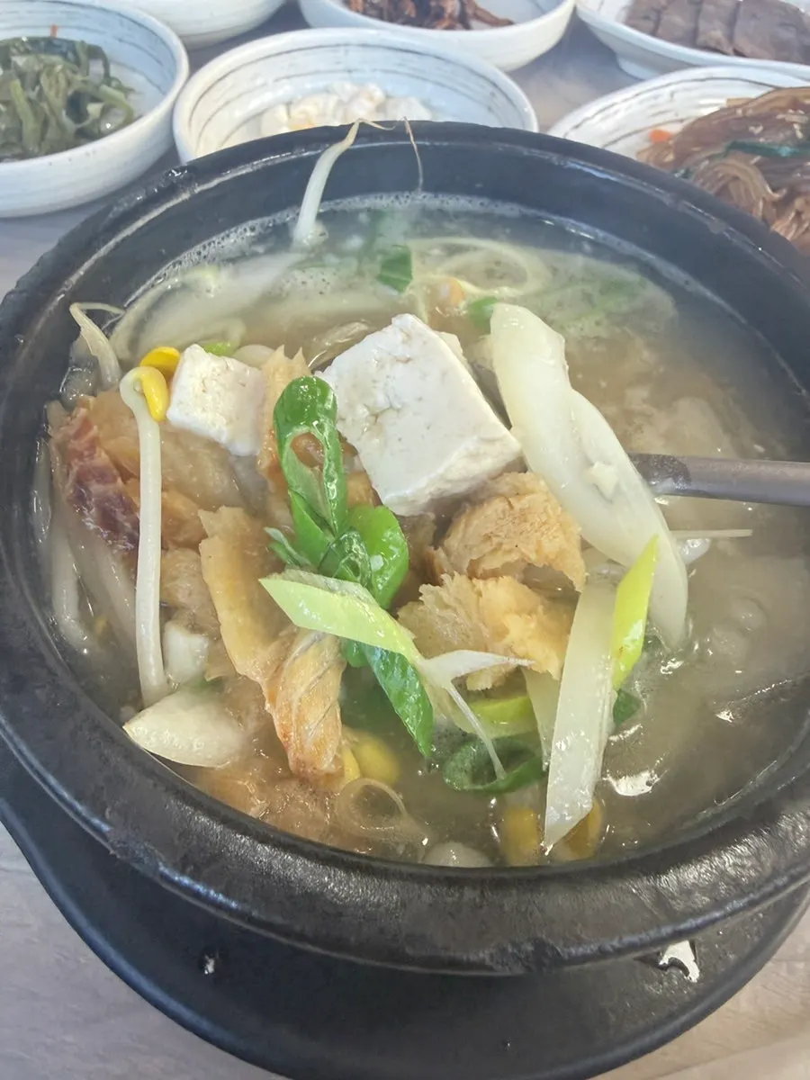 Table with both sundubu and hwangtae haejangguk together