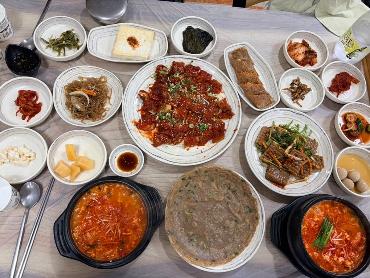 A table set with the grilled pollack set and sundubu