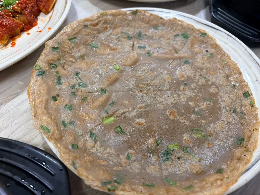 Banchan including buckwheat crepe and acorn jelly