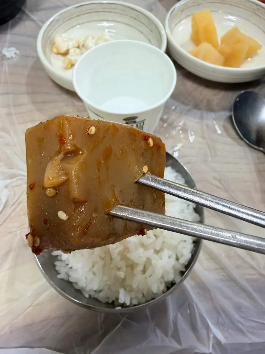 Close-up of grilled tofu and other sundubu set banchan
